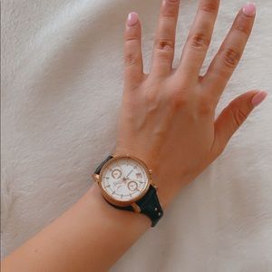 Fossil watch with a Navy strap.